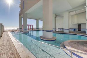 a large swimming pool in a large building at Majestic Beach Resort Tower 2- 1805 in Panama City Beach