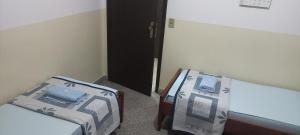Letto o letti in una camera di Das Heim Hotel