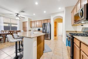 a kitchen with a sink and a counter top at Rancho Relaxo in Avondale