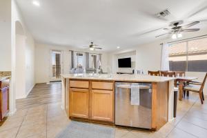 a kitchen with a large island and a dining room at Rancho Relaxo in Avondale