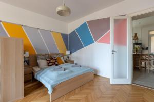 Posteľ alebo postele v izbe v ubytovaní Art Downtown Home styled by a Local Designer