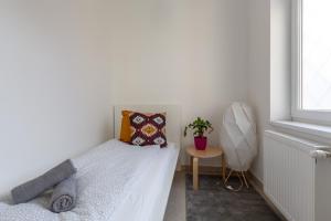 Posteľ alebo postele v izbe v ubytovaní Art Downtown Home styled by a Local Designer
