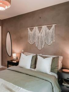 a bedroom with a large bed with a chandelier at Stylish 1Bed Apartment in Sheffield CC in Sheffield