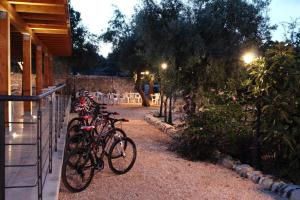 a group of bikes parked next to a building at Agriturismo Kypeiros in Noto