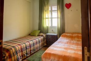 Posteľ alebo postele v izbe v ubytovaní Casa RECREO