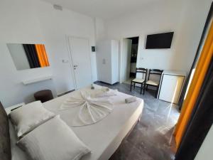 Postel nebo postele na pokoji v ubytování Hotel SEADEL