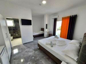Postel nebo postele na pokoji v ubytování Hotel SEADEL