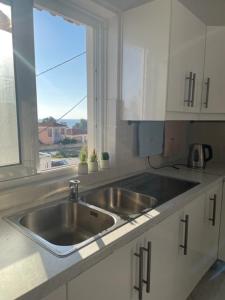 Kuchyň nebo kuchyňský kout v ubytování Dina Apartment