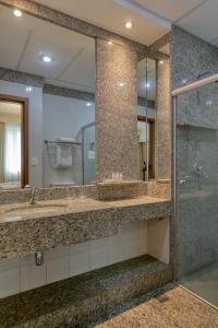 Um banheiro em Mercure Belo Horizonte Savassi