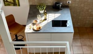 A kitchen or kitchenette at Il Barchio loft in un palazzo di fine 800 a Jesi