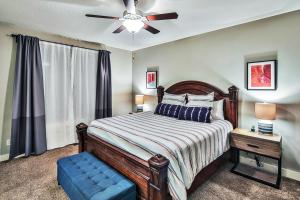 a bedroom with a bed and a ceiling fan at Entrada at Moab 594 in Moab +55 photos