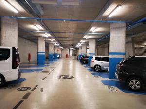 a parking garage with cars parked in it at Studio Apartmani 071 Free Garage Parking in Sarajevo