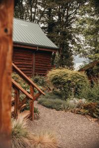Giardino di Wilder and Pine Riverside Cabins