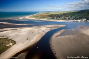 an aerial view of a beach and the ocean at Bay View Lodge, Brynowen in Borth