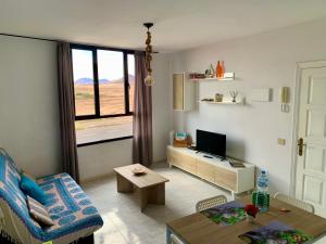 Telewizja i/lub zestaw kina domowego w obiekcie Casa Monny Fuerteventura Holiday Wi-Fi