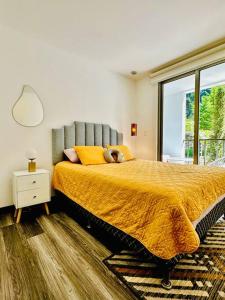 a bedroom with a bed with a teddy bear on it at Habitación privada in Guatemala