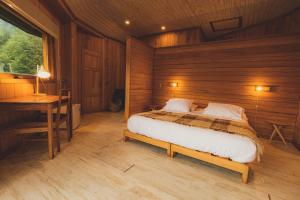 Ліжко або ліжка в номері Peuma Lodge Patagonia