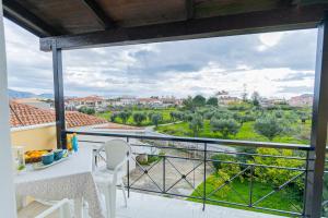 a view from the balcony of a house at Sarita's Apartments & Suite in Laganas