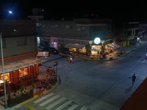 an overhead view of a city street at night at Altos Caution Apart in Concepción