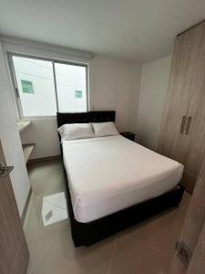 En eller flere senge i et værelse på Charming Apartment Northern Armenia