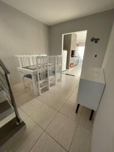 Foto sihtkohas Matinhos asuva majutusasutuse Tríplex de frente para o mar com 4 quartos galeriist