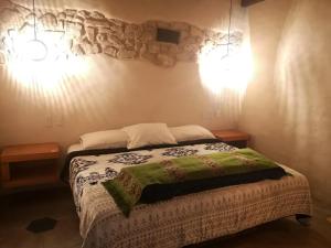 Postel nebo postele na pokoji v ubytování Hotel Pepen