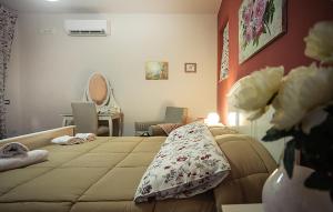 A bed or beds in a room at A Corte