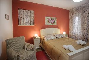 A bed or beds in a room at A Corte