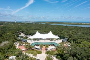 an aerial view of a building with a white tent at Casa Lovett - Tropical Bungalow in Saint Augustine