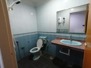 Koupelna v ubytování Mi Hotel 2 Dungun + 22 fotografií