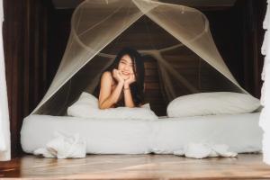 Кровать или кровати в номере Jungle Koh Kood Resort