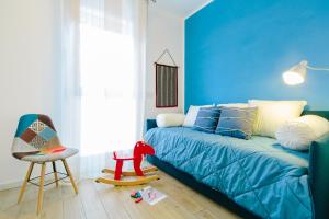 Postel nebo postele na pokoji v ubytování BLUE BAY GUEST HOUSE (IUN F0372)