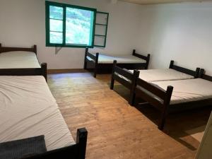 Postel nebo postele na pokoji v ubytování Chata POUSTEVNA ( Střelecká )