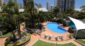 an overhead view of a swimming pool at a resort at Main Beach Coastal Apartment in Gold Coast