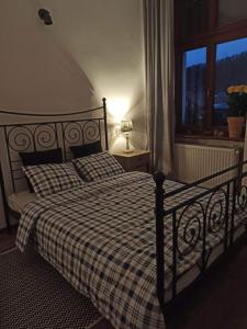 Posteľ alebo postele v izbe v ubytovaní Apartament Stara Tkalnia