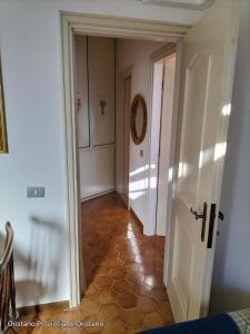 Gambar di galeri bagi Appartamento con vista giardino di Oristano