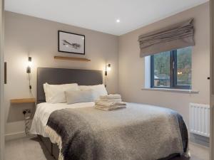 Postel nebo postele na pokoji v ubytování Pass the Keys Exceptional 3 Bedroom River View Apartment