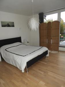 Llit o llits en una habitació de Gîte de L´ô d´Or