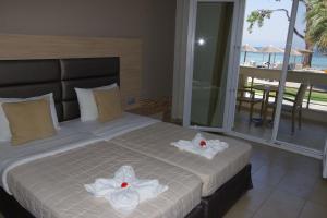 Postel nebo postele na pokoji v ubytování Rachoni Resort