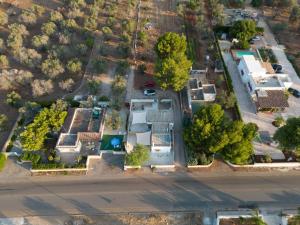 an overhead view of a yard with houses and trees at Bilocale Camilla in villa salento in Sant'Isidoro