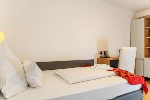 Postel nebo postele na pokoji v ubytování Bodensee-Hotel Kreuz