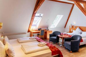 Postel nebo postele na pokoji v ubytování Bodensee-Hotel Kreuz