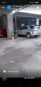 a picture of a car parked in a parking lot at Nhà Nghỉ Lâm Tùng in Nha Trang