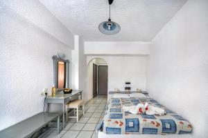 Postel nebo postele na pokoji v ubytování Hotel Iro + 22 fotografií