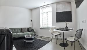 Posezení v ubytování B&B Vossebergen Hombeek