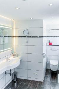 Koupelna v ubytování Bodensee-Hotel Kreuz + 37 fotografií