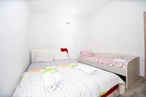 Postel nebo postele na pokoji v ubytování Lana