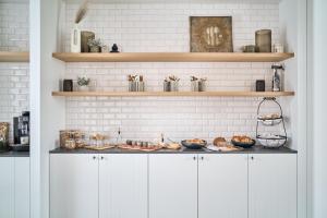 Kuchyň nebo kuchyňský kout v ubytování B&B Vossebergen Hombeek