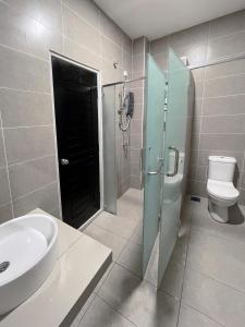 a bathroom with a sink and a toilet and a shower at LOW SEASON PROMOTION! 4B12B Mountainville Bungalow in Ipoh