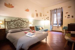 A bed or beds in a room at Trastevere Dream House